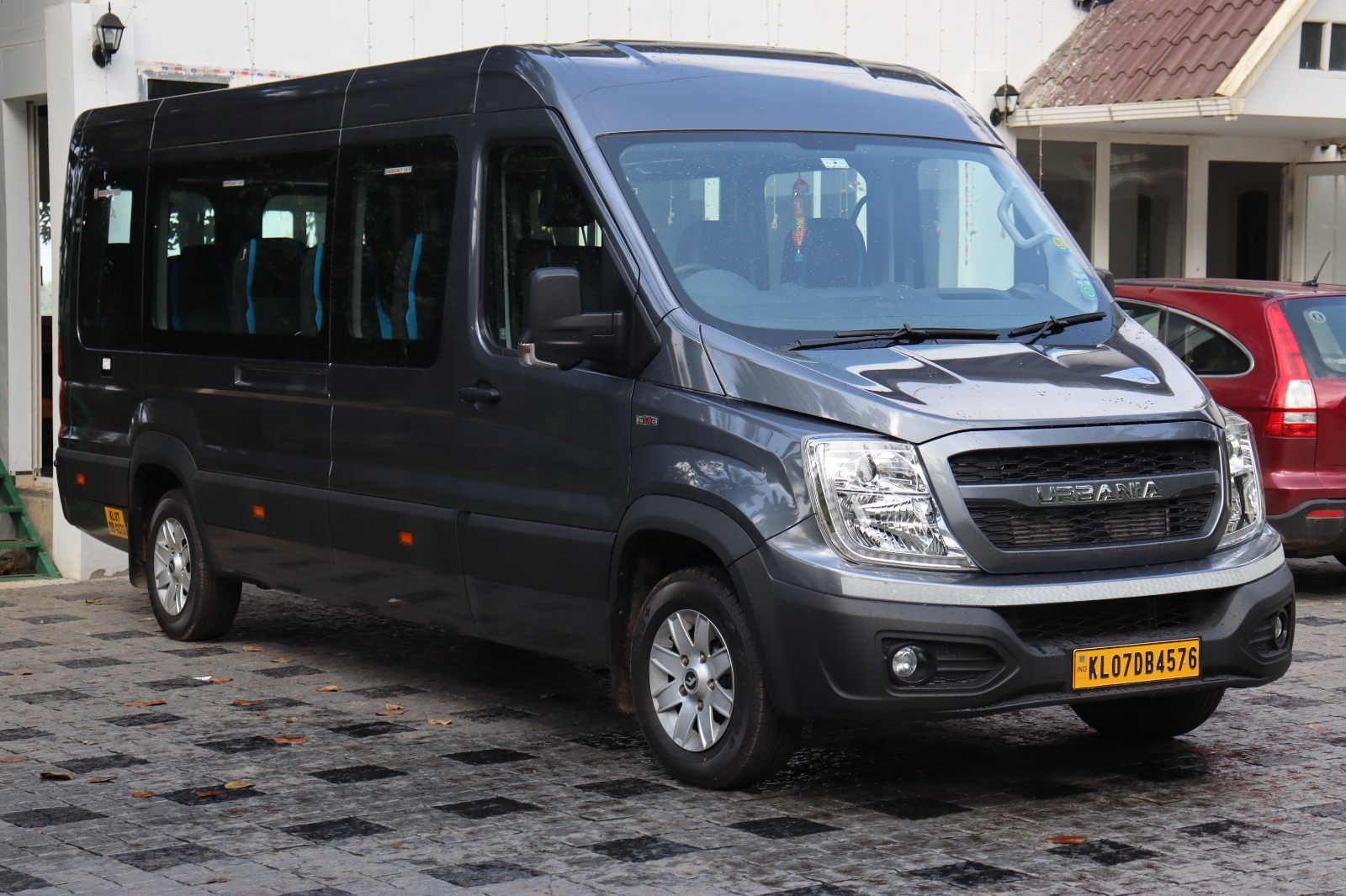 Ptempo traveller rental in cochin, traveller hire kerala, tempo traveller 12 seater rent per kmremium urbania